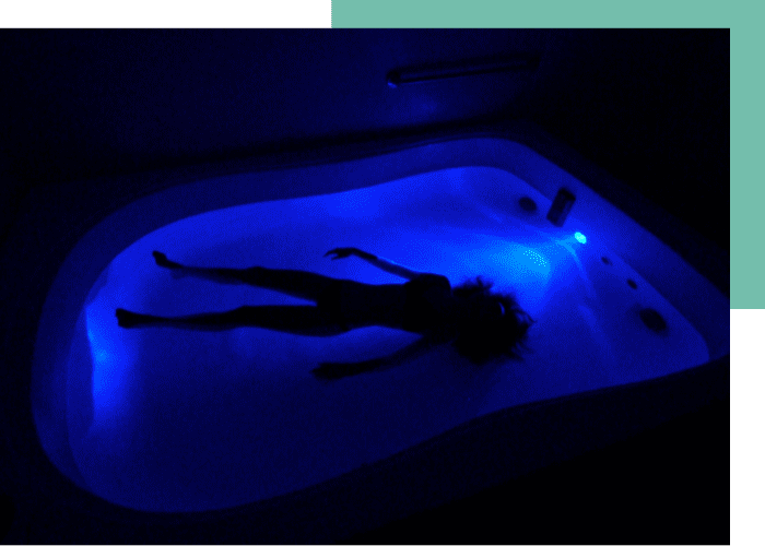 Woman floating in float tank